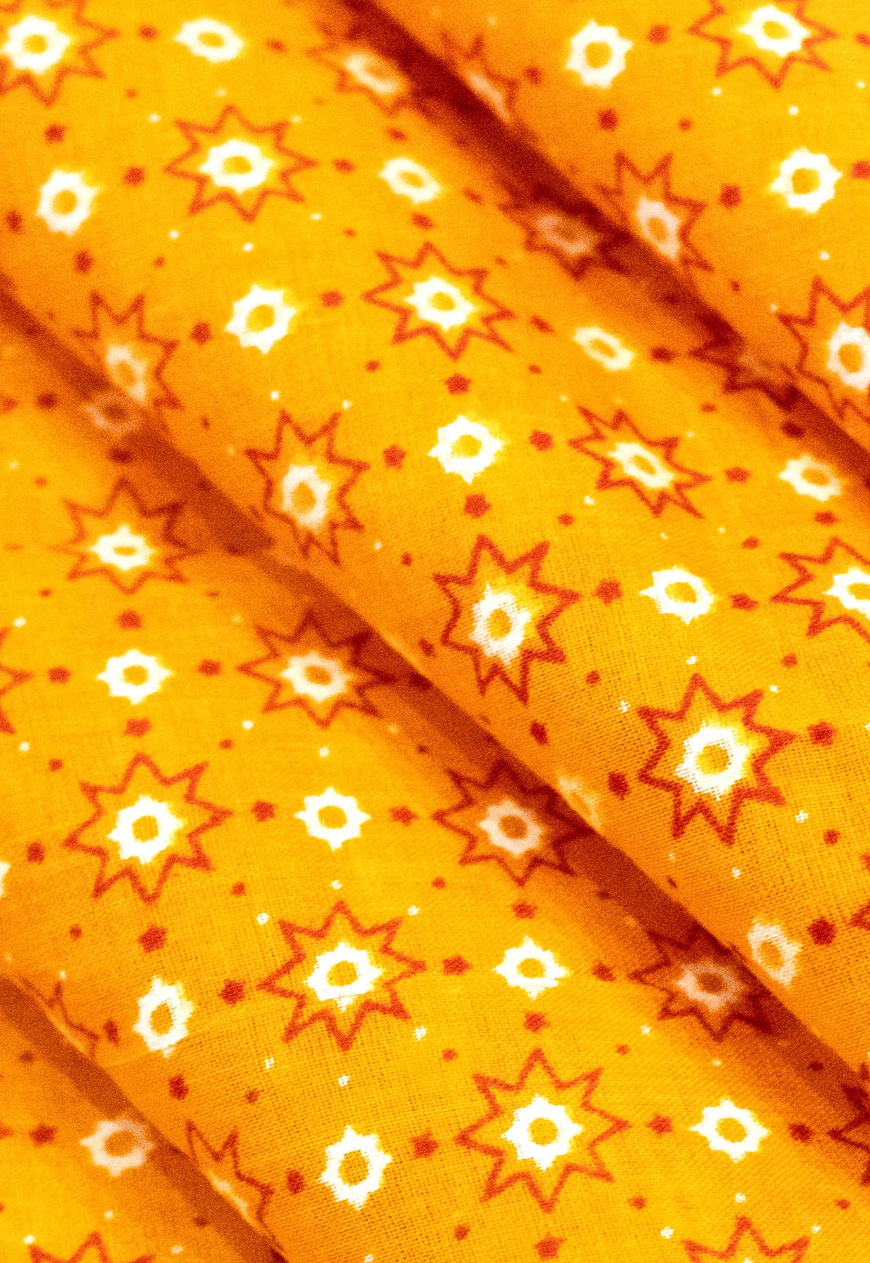 Unstitched rotary print with a traditional design on cotton fabric